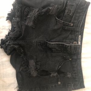 Black ripped jean shorts